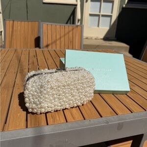Elegant Pearl-Studded Clutch